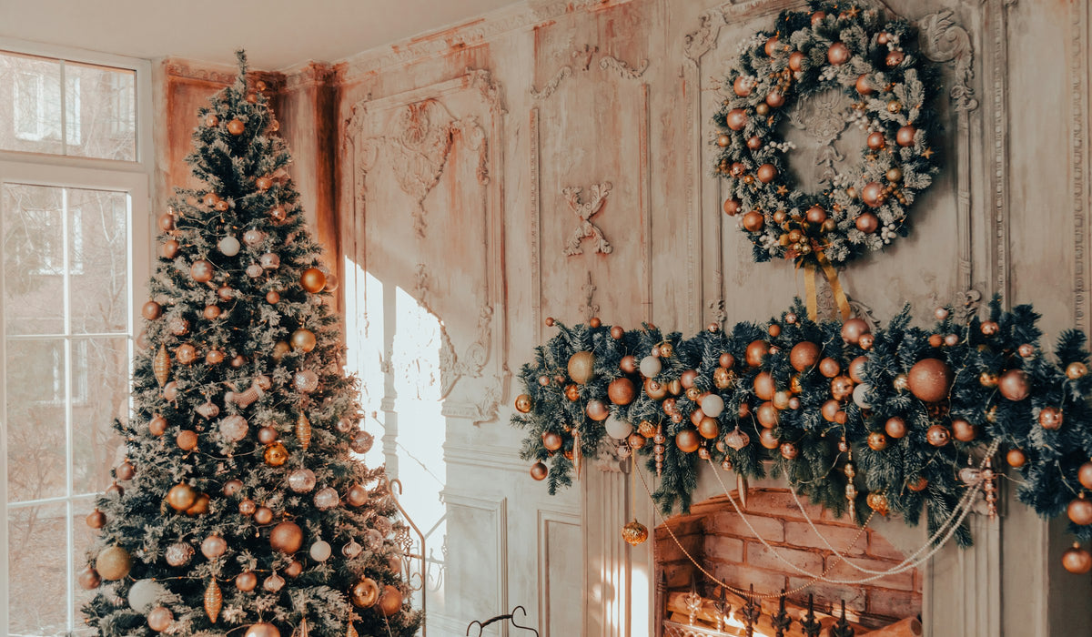 Living room decorated for Christmas with a fireplace